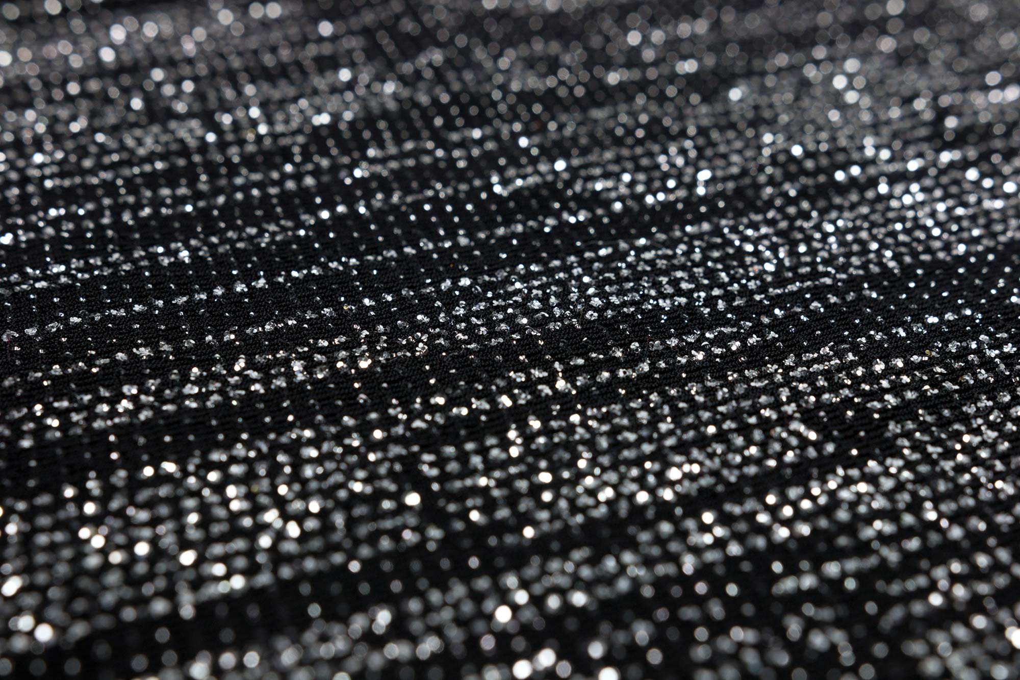 Poudre glitter appliquée sur un textile